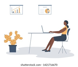 Office worker in the workplace. Young black woman is sitting at the desk in the office room. There is a chair, a laptop, diagrams and a cactus flower in the picture. Funky flat style. Vector