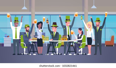 Office Workers Celebrate Happy St. Patrick Day At Workplace Wear Green Hats And Drinking Beer Together Flat Vector Illustration