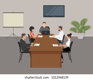 Office workers during the meeting. Young women and men are sitting at the table in the office. Conference hall. On the table is laptop, paper for notes and pencils. There is also a flower here. Vector