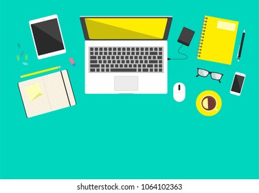 Office workplace on a turquoise background the top view