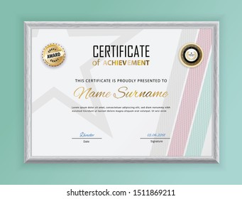 Official certificate with stripes, and star hanging on wall. Business modern design blank in grey border. Gold emblem