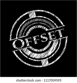 Offset chalk emblem written on a blackboard