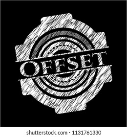 Offset chalk emblem written on a blackboard