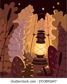 oil lamp on the lawn with purple flowers at night