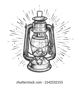 Oil lantern or kerosene lamp with rays of light. Hand drawn sketch vintage vector illustration