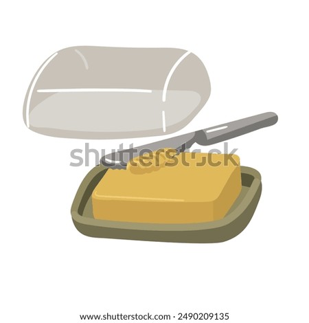 Oil pan with a piece of butter and a glass lid, a metal knife cuts off a layer of oil. Perfect adding juiciness and flavor to your culinary creations. Isolated piece of butter is cut off with a knife