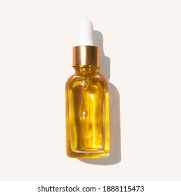 Oil serum glass bottle with trendy hard shadow isolated realistic vector illustration, top view. Aromatherapy oil