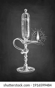 Oil-lamp clock. Chalk sketch on blackboard background. Hand drawn vector illustration. Retro style.