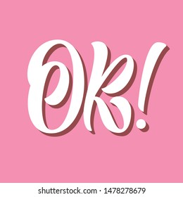 Ok! brush hand lettering on retro pink  background with 3d shadow. Vector script typography illustration.
