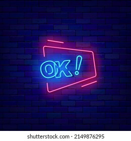 Ok comic speech bubble neon sign. Consent concept. Pop art style. Shiny signboard. Emotion idea on brick wall. Editable stroke. Vector stock illustration