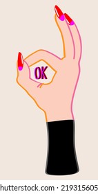 OK hand gesture. Female hand with long red nails in black clothes. Isolated on light background.
