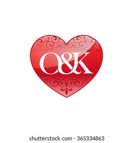 O&K initial letter logo with ornament heart shape
