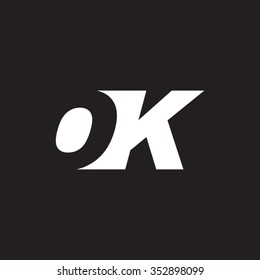 OK negative space letter logo black background