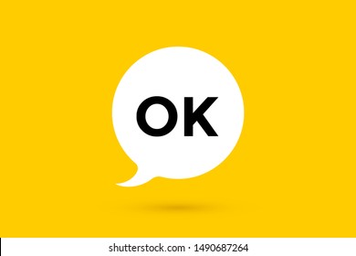 OK, Okay. Banner, speech bubble, poster and sticker concept with text OK. White bubble message ok or okay on bright yellow background for banner, poster. Vector Illustration