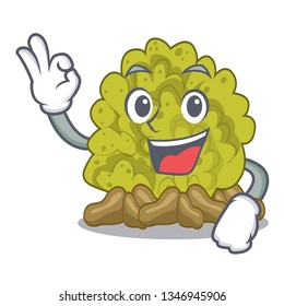 Okay miniature green coral reef with mascot