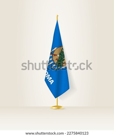 Oklahoma flag on a flag stand. Vector illustration.