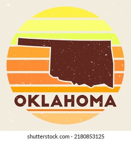 Oklahoma logo. Sign with the map of the US state and colored stripes, vector illustration. Can be used as insignia, logotype, label, sticker, or badge of Oklahoma.