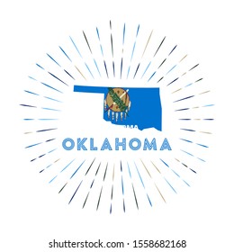 Oklahoma sunburst badge. The us state sign with map of Oklahoma with state flag. Colorful rays around the logo. Vector illustration.