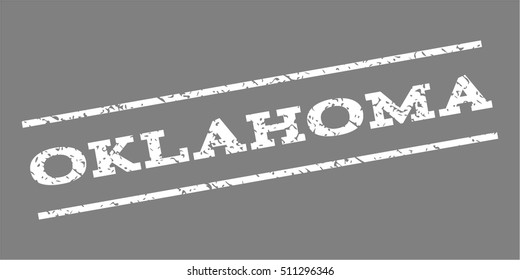 Oklahoma watermark stamp. Text caption between parallel lines with grunge design style. Rubber seal stamp with unclean texture. Vector white color ink imprint on a gray background.
