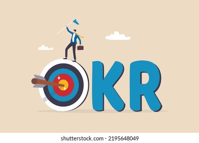 OKR, Objective And Key Result Framework To Measure Success And Improvement, Goal Setting Or Define Measurable Target For Business Concept, Businessman Holding Winning Flag On Target With The Work OKR.