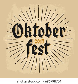 Oktoberfest 2017 lettering with rays. Vector vintage engraving illustration on brown old paper background.