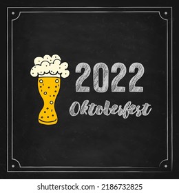 Oktoberfest 2022 - Beer Festival. Hand-drawn Doodle Elements. German Traditional holiday. Glass mug of beer on a black chalk board with lettering.