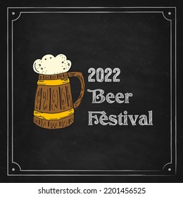 Oktoberfest 2022 - Beer Festival. Hand-drawn Doodle Elements. German Traditional holiday. Wooden mug of beer on a black chalk board with lettering.