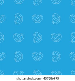 Oktoberfest background. German pretzels seamless pattern on white background.  Sketchy hand drawn doodle. 