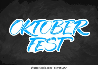 Oktoberfest blue and white lettering on chalkboard. Handwritten modern calligraphy, brush painted letters. Vector illustration. Template for banners, posters, merchandising, cards or photo overlays.