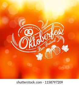 Oktoberfest hand drawn vector lettering and beer glass. Modern brush calligraphy. autumn background.