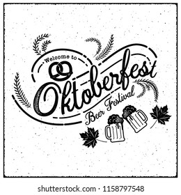 Oktoberfest hand drawn vector lettering and beer glass. Modern brush calligraphy. grunge background.