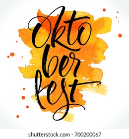 Oktoberfest ink lettering on watercolor background. Handwritten modern calligraphy, brush painted letters. Vector illustration. Template for banner, poster, merchandising, card or photo overlay.