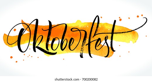 Oktoberfest ink lettering on watercolor background. Handwritten modern calligraphy, brush painted letters. Vector illustration. Template for banner, poster, merchandising, card or photo overlay.
