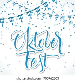 Oktoberfest lettering with carnival flag and confetti background. Handwritten modern calligraphy, brush painted letters. Vector illustration. Template for banners, posters, cards or photo overlays.