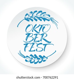 Oktoberfest lettering with hand drawn barley ears. Modern calligraphy, brush painted letters. Vector illustration. Template for banners, posters, invitations, merchandising, cards or photo overlays.