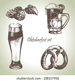 Oktoberfest set of beer, hops and pretzel. Hand drawn illustrations