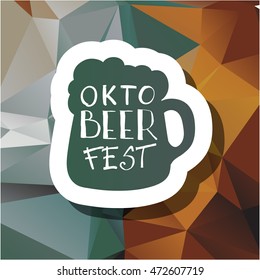 Oktoberfest typographic design on triangle background. Decoration usable as banner, cards, posters, label, badge. Holiday Beer cup Illustration With Lettering Composition.