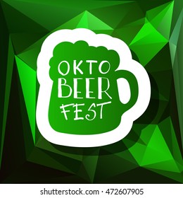 Oktoberfest typographic design on triangle background. Decoration usable as banner, cards, posters, label, badge. Holiday Beer cup Illustration With Lettering Composition.