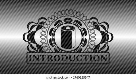 old battery icon and Introduction text carbon fiber realistic badge. Polymer texture exquisite background. Illustration. 