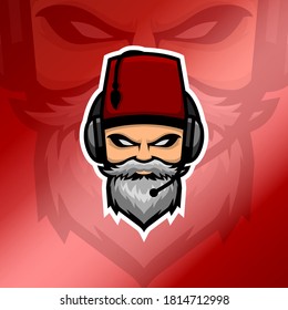 Old beard man esport logo with headset and red fez hat in glossy red gradient background. White beard man logo. Suitable for gaming squad or clan logo