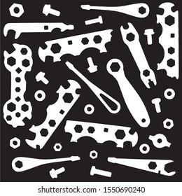 Old bicycle tools in a workshop. Spanners, screwdrivers, nuts and bolts.