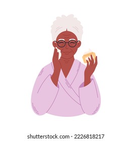 Old black woman applying organic cosmetic cream on face. Senior woman with wrinkles doing anti age procedures. Hand drawn vector illustration