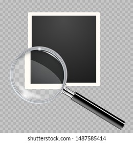 Old blank square photo with magnifying glass with magnifying effect on a transparent background. Retro photo frame placed on transparent background. Transparent magnifying glass on a blank photo frame