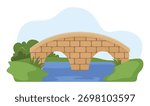 Old brick bridge arches over blue river surrounded by green hills and trees on a sunny day