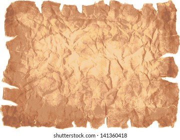 Old brown crumpled paper sheet with torn edges