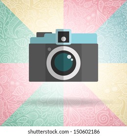 old camera hipster illustration on doodle pattern background