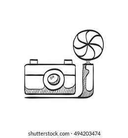 Old camera icon in doodle sketch lines. Photography picture electronic imaging vintage analog film
