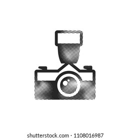 Old camera icon in halftone style. Black and white monochrome vector illustration.