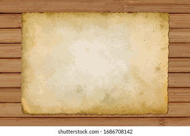 old card of paper on wooden background