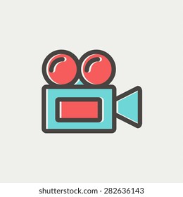 Old cinema video cam icon thin line for web and mobile, modern minimalistic flat design. Vector icon with dark grey outline and offset colour on light grey background.